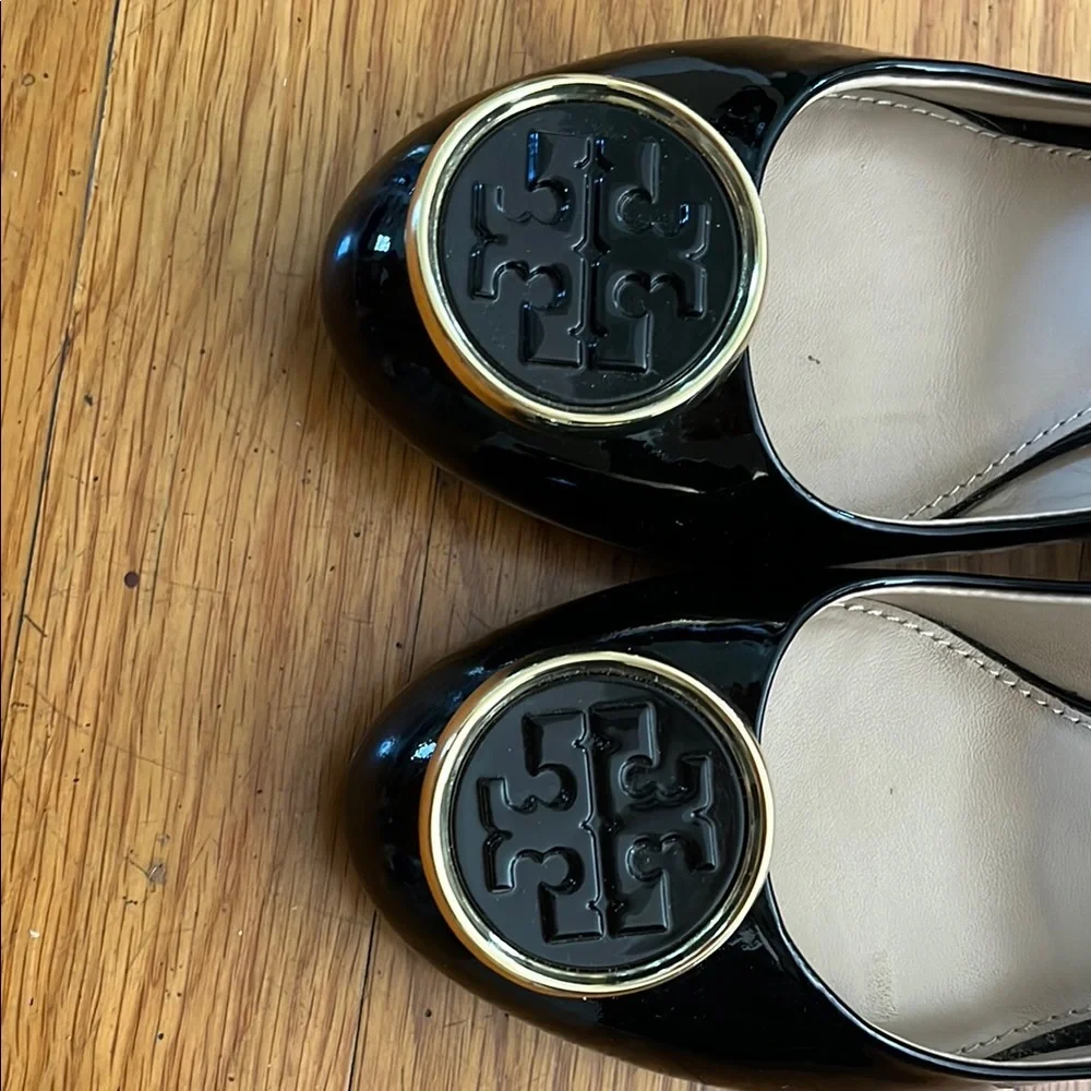 Tory Burch Black Patent Logo Cap-Toe Heels with Gold Trim